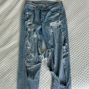extremely ripped mom jeans